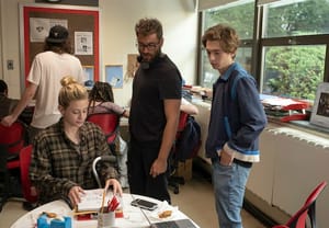 Lili Reinhart as Grace Town, Director Richard Tanne, and Austin Abrams as Henry Page behind the scenes on the set of CHEMICAL HEARTS