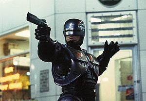 Robocop Writer and Director Reteam for Erotic Thriller; Alec Baldwin Denies Pulling Trigger; a Licorice Pizza Secret Cameo