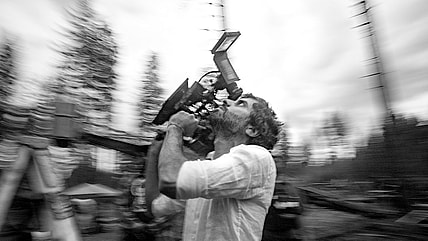 Train Dreams. Director of Photography Adolpho Veloso on the set of Train Dreams. Cr. Daniel Schaefer/BBP Train Dreams. LLC.