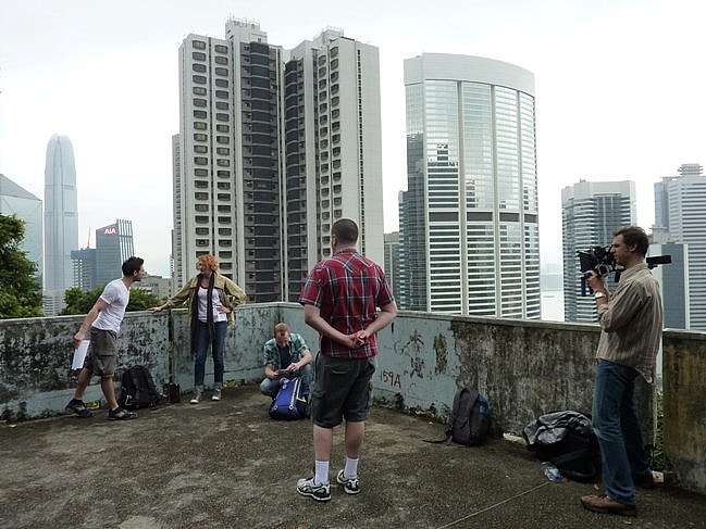 Balderson (center) shooting with crew in Hong Kong