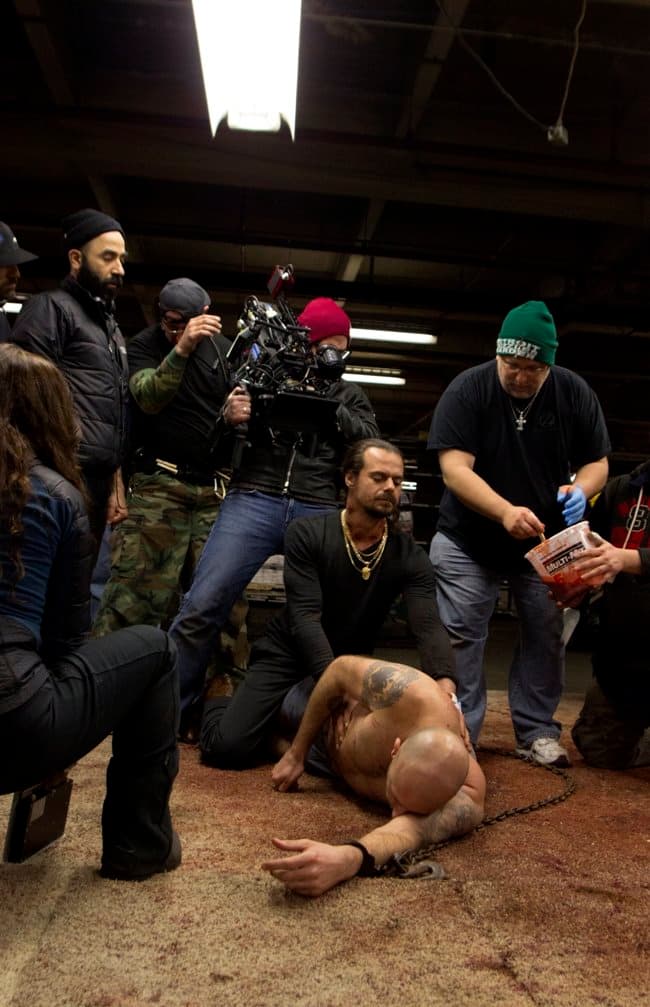 Getting the neck stabbing shot ready -- Director Malik Bader, DP Christos Moisides and SFX Dan Phillips with actors Paskoski and Shreli. Photograph by Tom Meredith 