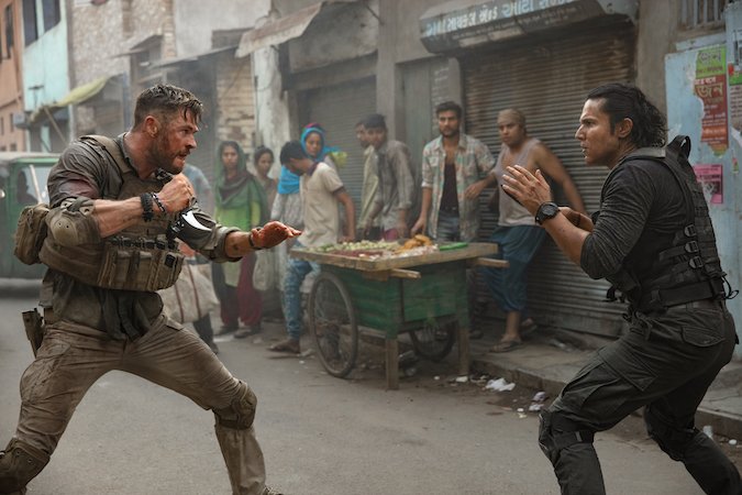 Chris Hemsworth and Randeep Hooda in the 12-minute "oner" in Extraction, directed by Sam Hargrave