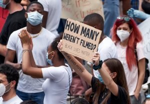 Black Lives Matter sign How Many Weren't Filmed Derek Chauvin George Floyd