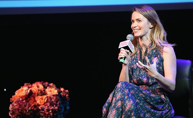 Emily Blunt in conversation. Courtesy of Getty Images.